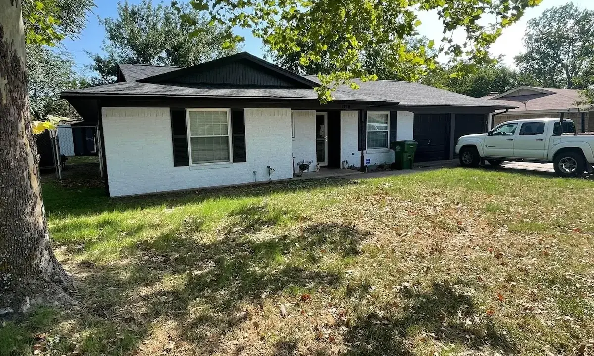 Professional roofing crew working on a residential roof in Boulder City